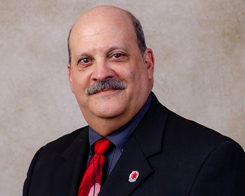 Professional headshot photo of John Todaro